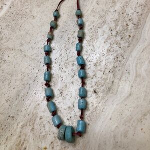 Turquoise Color Beads on knotted rawhide Necklace